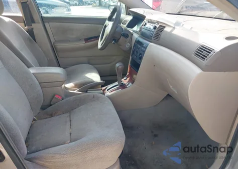 2003 Toyota Corolla Le z USA, uszkodzony, nr VIN 2T1BR32E63C005853